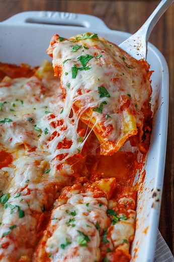 75K views · 1.4K reactions | It has all the amazing flavor that makes Italian food so irresistible, and it’s incredibly easy to make. RECIPE: https://natashaskitchen.com/manicotti-recipe/ | NatashasKitchen.com | Facebook