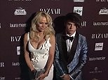 Pamela Anderson brings son Dylan Jagger to the Harper's party