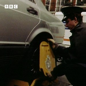 Forty years ago, an enterprising businessman was out to solve the problem of London's clamped cars, a deterrent which was introduced earlier in May. | BBC Archive