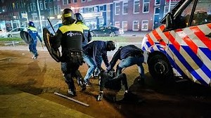 Netherlands vows to keep Covid curfew in place following more riots