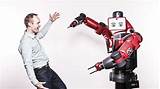 Humans And Robots Working Together Photos