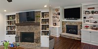 Family Room Renovations with Stone Fireplace and Bookcases