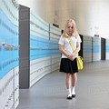 Scared Girl in School Hallway Walking