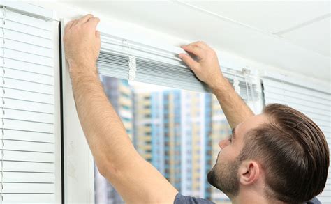 Reinstalling and testing the blinds after repair