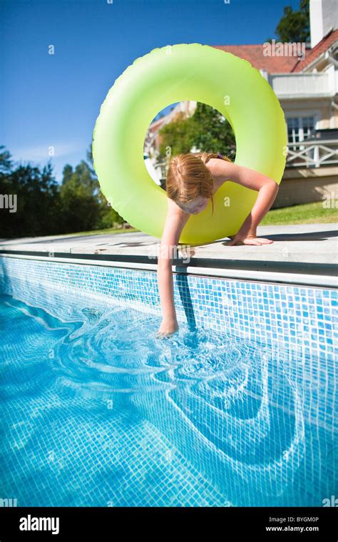 checking water in inflatable pool