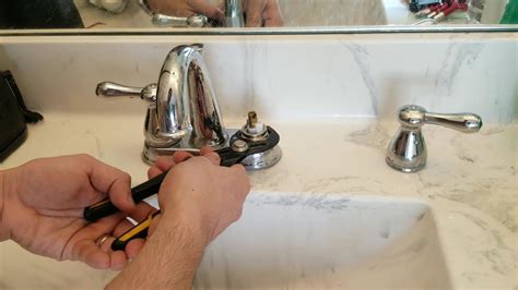 reattaching the faucet and testing for leaks