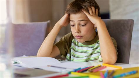 kid struggling with homework