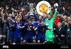 The Manchester United team lift the trophy after winning the UEFA ...