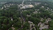 4.8K stock footage aerial video flying over suburban homes to approach ...