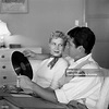 Actor Gene Barry relaxes at home with his wife Betty Claire Kalb in ...