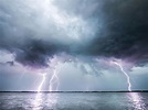 Lightning Over Body of Water · Free Stock Photo