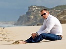 James Bond actor, Daniel Craig at the beach wearing white shirt on ...