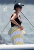 Ivanka Trump models a plunging black swimsuit as she soaks up the sun ...