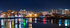 Wilmington skyline panorama reflected in Christiana River. Wilmington ...