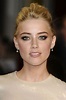 Download Actress Amber Heard at a film premiere | Wallpapers.com