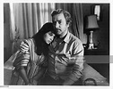 Elpidia Carrillo is comforted by her husband Michael Caine in a scene ...