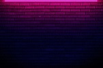 Brick wall in neon light. | Premium Photo