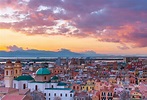 Sunset on Cagliari, evening panorama of the old city center in Sardinia ...