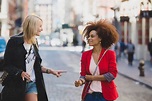 "Two Young Women Talking In The Street" by Stocksy Contributor "Lauren ...