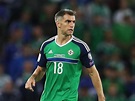Aaron Hughes to continue for Northern Ireland as long as he has club ...