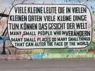 Quote of the Berlin Wall 'Many small people who in many small places do ...