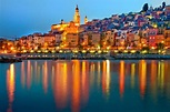 Royalty Free Image | Menton Provence village at night with water ...