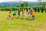 Active children playing yard games | Nature Stock Photos ~ Creative Market