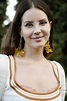Lana Del Rey sizzles in plunging yellow top as she teases single 'Tulsa ...