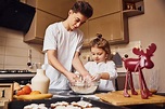 Brother with His Little Sister Preparing Food by Using Flour on Kitchen ...