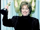 Kathy Bates holds the Oscar she won for her exceptional role as Annie ...