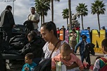 Dozens From Migrant Caravan Line Up at Border, Seeking Asylum ...