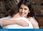 Portrait of Young Beautiful Wife Embracing Husband Stock Image - Image ...