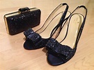 A navy glitter clutch bag that goes with my sparkly blue wedding shoes ...