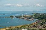 HollandLuchtfoto | Lelystad - Luchtfoto overzicht met het IJsselmeer