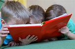 Children Reading A Book - Business In The Community