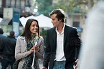 Couple walking and talking together outdoors - Stock Photo - Dissolve