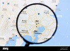 Map of Tokyo on Google Maps under a magnifying glass Stock Photo - Alamy