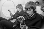 Ringo Starr and George Harrison on board an aircraft during their tour ...