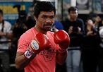 Manny Pacquiao gives away bulk of £350m fortune to poor ahead of fight ...