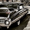 Slick Black Cadillac Photograph by Dave Hall