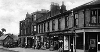Old photograph of shops in Lenzie situated six miles from Glasgow ...