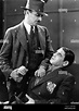 C. HENRY GORDON and PAUL MUNI as Tony Camonte in SCARFACE 1932 ...