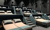 Reclining seats are passe’ – This movie hall has decadent double beds ...
