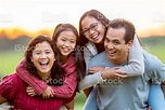 Filipino Family Laughing Piggyback Portrait Stock Photo Stock Photo ...