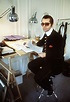 Karl Lagerfeld sits at his desk in 1979. – Bygonely