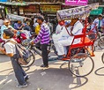 Indian men uses the rickshaw for transportation in old Delhi – Stock ...