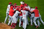 Reds celebrate following playoff-clinching victory | WKRC