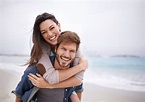 Love, Piggyback and Portrait of Couple at a Beach, Hug and Laughing ...