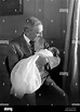 U.S. President Woodrow Wilson holding his Grandson Francis Bowes Sayre ...