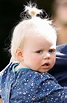 Mike Tindall carries daughter Lena Tindall as they attend day 3 of ...